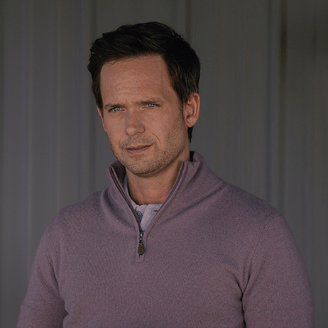 Patrick J. Adams as Russell McIntosh in The Madison